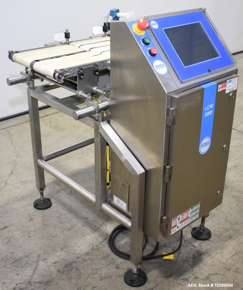 Used Loma LCW-3000 Belt Checkweigher with Reject. Up to 6.6 lbs capacity.